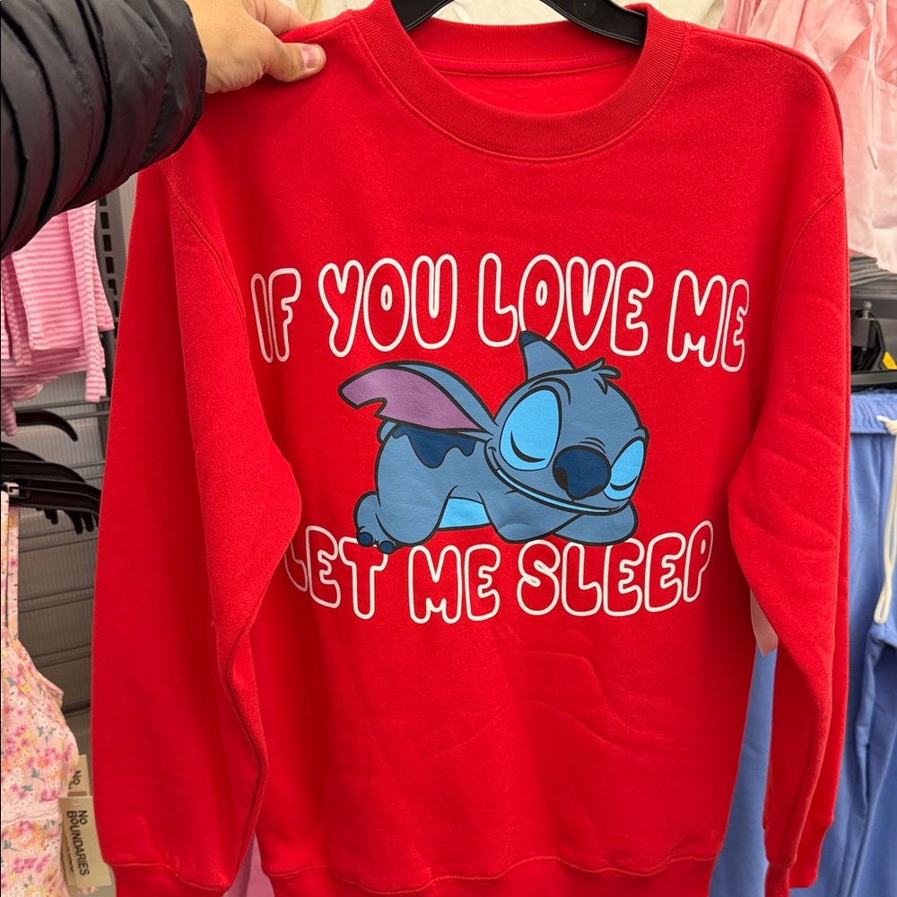 Red Sweatshirt with Sleeping Character Design